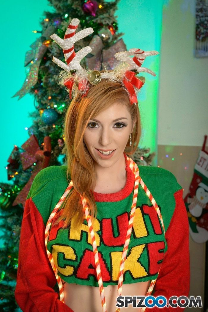 Busty redhead Lauren Phillips is naked in front of Xmas tree-09