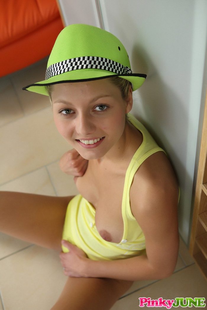 Young nice girl Pinky June masturbates with dildo in striped socks and hat-05